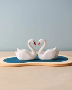 Handmade Wooden Swans In A Lake